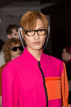 MILAN, ITALY - JUNE 17: Beautiful model poses in the backstage just before Edithmarcel show during Milan Men's Fashion Week on JUNE 17, 2019 in Milan.のeditorial素材