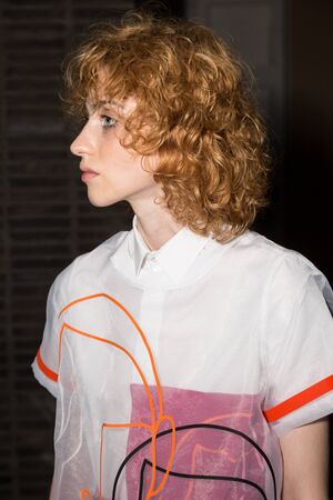 MILAN, ITALY - JUNE 17: Beautiful model poses in the backstage just before Edithmarcel show during Milan Men's Fashion Week on JUNE 17, 2019 in Milan.のeditorial素材