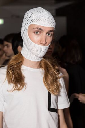 MILAN, ITALY - JUNE 17: Beautiful model poses in the backstage just before Edithmarcel show during Milan Men's Fashion Week on JUNE 17, 2019 in Milan.のeditorial素材