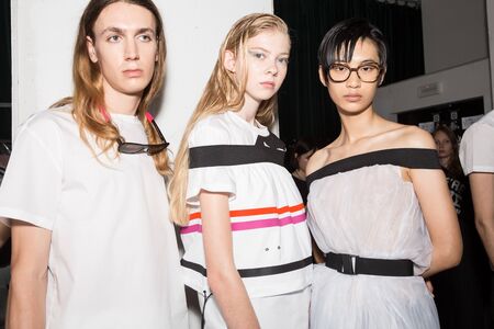 MILAN, ITALY - JUNE 17: Beautiful models pose in the backstage just before Edithmarcel show during Milan Men's Fashion Week on JUNE 17, 2019 in Milan.のeditorial素材