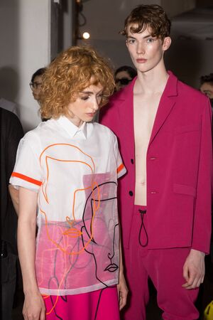 MILAN, ITALY - JUNE 17: Beautiful models pose in the backstage just before Edithmarcel show during Milan Men's Fashion Week on JUNE 17, 2019 in Milan.のeditorial素材