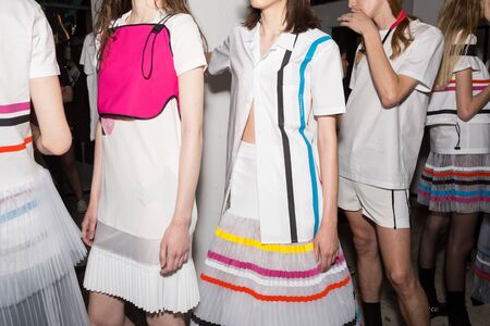 MILAN, ITALY - JUNE 17: Beautiful models pose in the backstage just before Edithmarcel show during Milan Men's Fashion Week on JUNE 17, 2019 in Milan.のeditorial素材