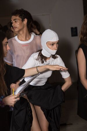 MILAN, ITALY - JUNE 17: Beautiful model poses in the backstage just before Edithmarcel show during Milan Men's Fashion Week on JUNE 17, 2019 in Milan.のeditorial素材