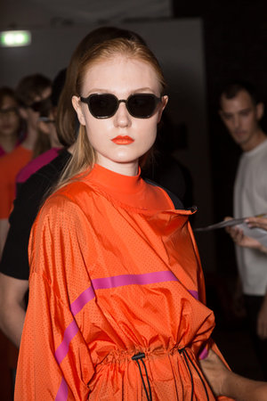 MILAN, ITALY - JUNE 17: Beautiful model poses in the backstage just before Edithmarcel show during...
