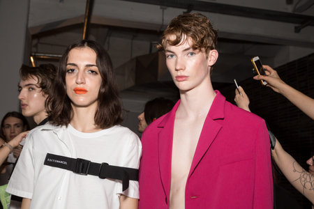 MILAN, ITALY - JUNE 17: Beautiful models pose in the backstage just before Edithmarcel show during...