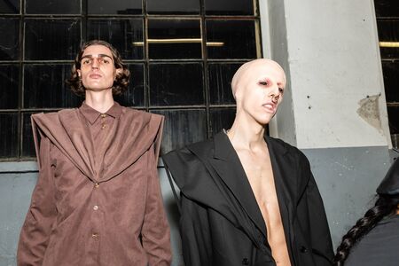MILAN, ITALY - JANUARY 12: Models pose in the backstage just before Han Kjobenhavn show during Milan Men's Fashion Week on JANUARY 12, 2020 in Milan.のeditorial素材