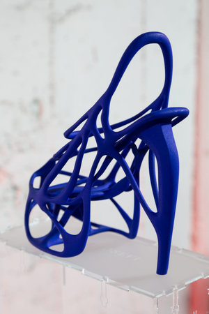 MILAN, ITALY - FEBRUARY 20: Wearable 3D printed shoes by fashion designer Naim Josefi are seen on...