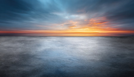 A dramatic, wide landscape showcasing a concrete plane under a dynamic, colorful sunset skyの素材