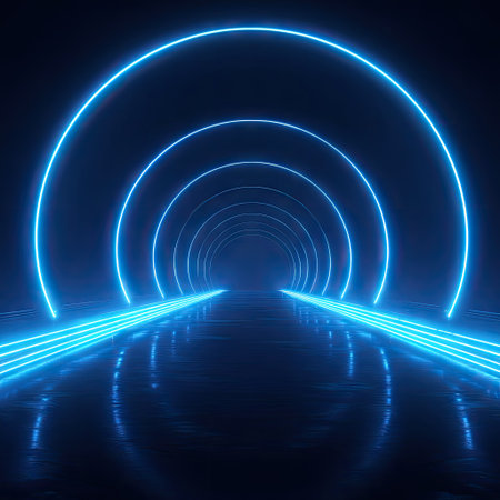 A digital rendering presents a tunnel composed of illuminated neon rings in various sizes. The bright blue lights create a symmetrical, perspective composition, with reflections on a dark surface. The artwork may be suitable for presentations, design projects, or thematic illustrations about technology.の素材