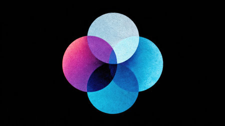 An abstract composition features four overlapping circles in shades of pink, blue, and purple set against a stark black backdrop. The circles display a textured effect, with a translucent quality allowing for color blending. This design could be suitable for digital art, graphic design, and various commercial applications.の素材