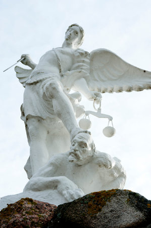 Sculpture of white angel criminal justice with his swordの写真素材