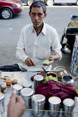eyed street vendor of betel in Mumbaiのeditorial素材