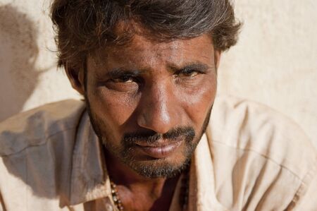 the face of a beggar in the old temple near Goaのeditorial素材