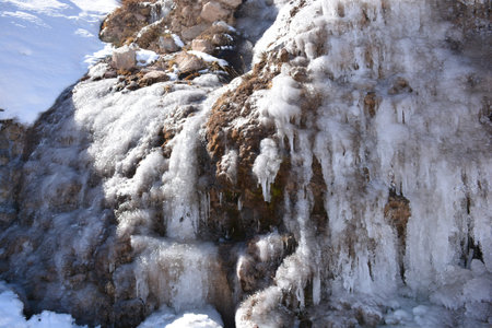 Frozen river during winter at a mountain in Santiago, Chileの写真素材