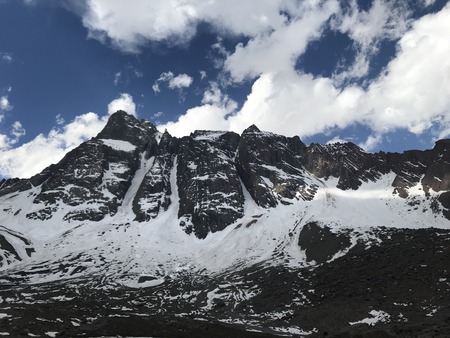 Landscape of mountain snow and valley in Santiago, Chileの写真素材