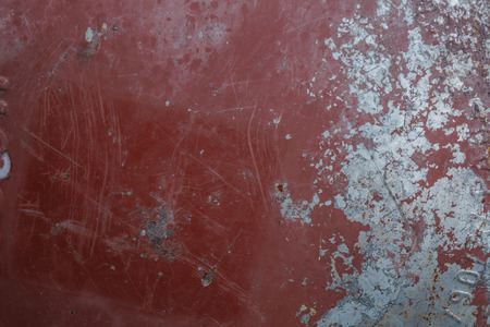 rusty aged metal vintage red backgroundの写真素材
