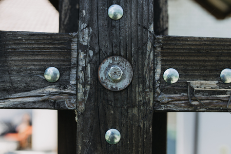wooden detail with metal screwsの写真素材