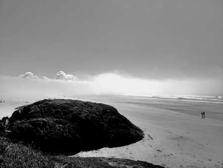 Large rock at shoreline of Long Beach, BC.の写真素材