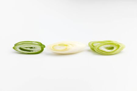 Delicious green onions. Succulent green onions. White background waveの写真素材