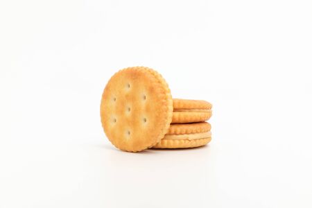 Peanut cream between biscuits. Cookies with peanut butter. Crispy dessertの写真素材