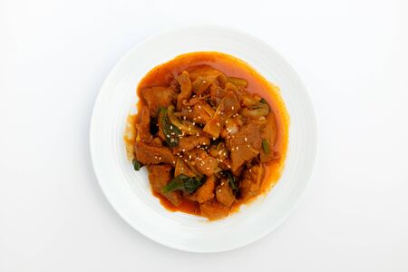 Stir-fried pork with red pepper paste. Spicy and sweet dish. Stir-fried Korean porkの写真素材
