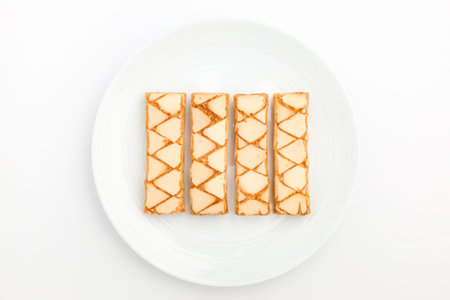 Pastry with apricot jam and meringue. Elongated dessert. Sweet and soft dessert