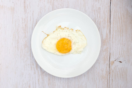 Fried egg. Fried eggs in a round shape. Plain food. Egg dishes
