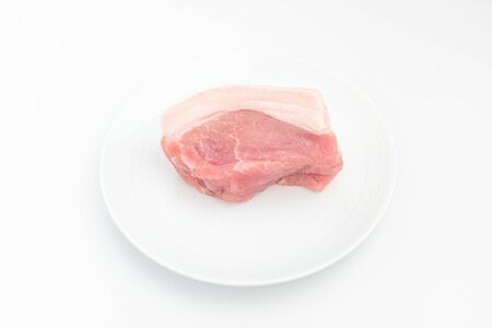 Pork hind leg. Meat with shells and fat and muscles. Thick meatの写真素材