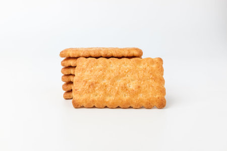 Snacks in square shape. Dessert with butter and coconut flavor. Crispy snack