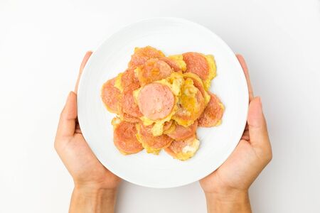 Sausage made from fish meat. Soft sausage. Sausage with egg doughの写真素材