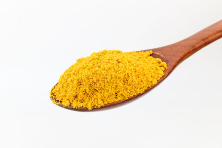 Yellow curry powder. Ingredients for curry. Indian culture food