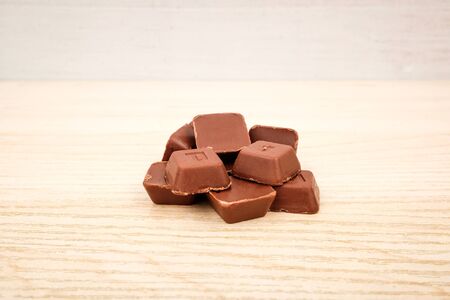 Sweet milk chocolate. Dessert with milk and cacao. Block shaped dessertの写真素材