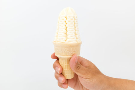Cone shape ice cream. Vanilla flavor ice cream. Soft and sweet frozen food
