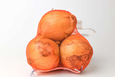 Raw onion. Peeled onion. Onion in a round shapeの写真素材