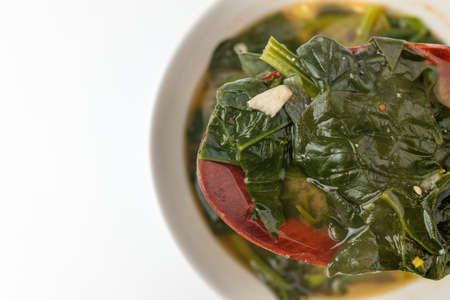 Asian food culture. Miso soup with vegetables. Cooking broth with vegetablesの写真素材