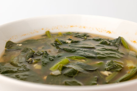 Asian food culture. Miso soup with vegetables. Cooking broth with vegetables