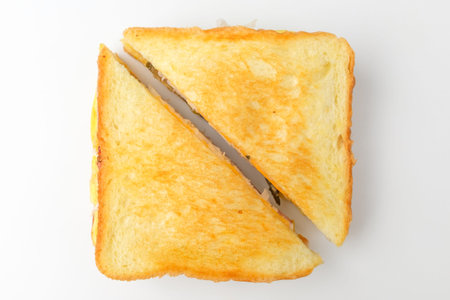 One kind on a sandwich. Vegetables, ham, cheese, and eggs. Easy meal made from breadの写真素材