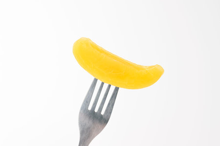 Canned sweet fruit. Yellow peach. Sliced â€‹â€‹fruit. Sweet and tender peaches