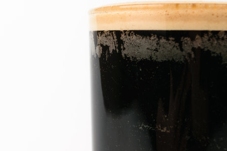 Drink in black hues. Black tassel. Irish food culture. Black beerの写真素材