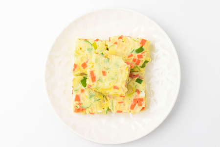 Steamed cooked egg. Food with a pudding-like texture. Dishes with vegetablesの写真素材