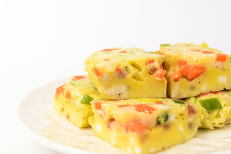 Steamed cooked egg. Food with a pudding-like texture. Dishes with vegetablesの写真素材