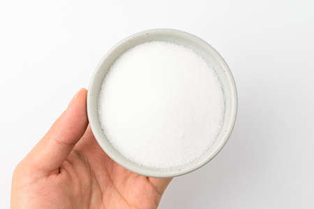 Sweet food. Powdered food. White powder seasoningの写真素材