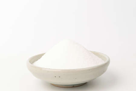 Sweet food. Powdered food. White powder seasoningの写真素材