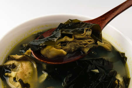 Oyster soup dish. Seafood and seaweed dishes. Asian food cultureの写真素材