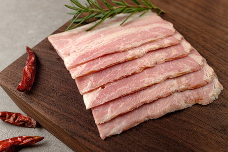 food made from pork. thinly sliced â€‹â€‹â€‹â€‹bacon. fatty pork