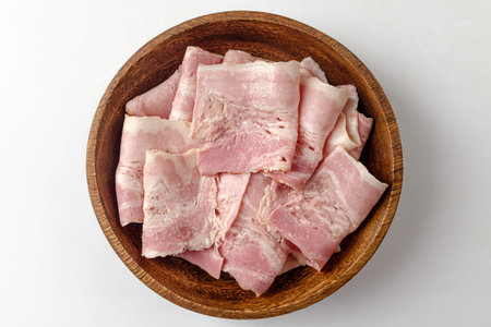 food made from pork. thinly sliced â€‹â€‹â€‹â€‹bacon. fatty pork