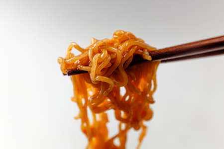 Ramen seasoned with red pepper paste. Spicy and Sweet Noodles. Korean food cultureの写真素材