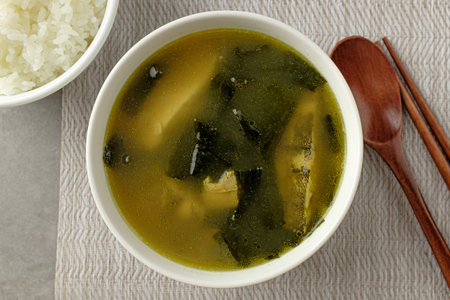 Broth dish with flounder. Dishes with seafood and seaweed. Korean food cultureの写真素材