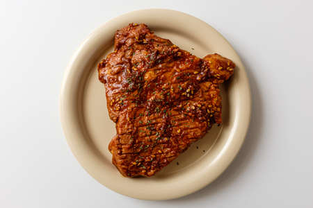 Pork neck barbecue on white backgroundの写真素材