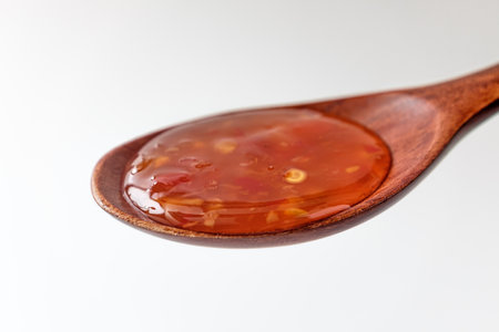 sweet chili sauce on white backgroundの写真素材
